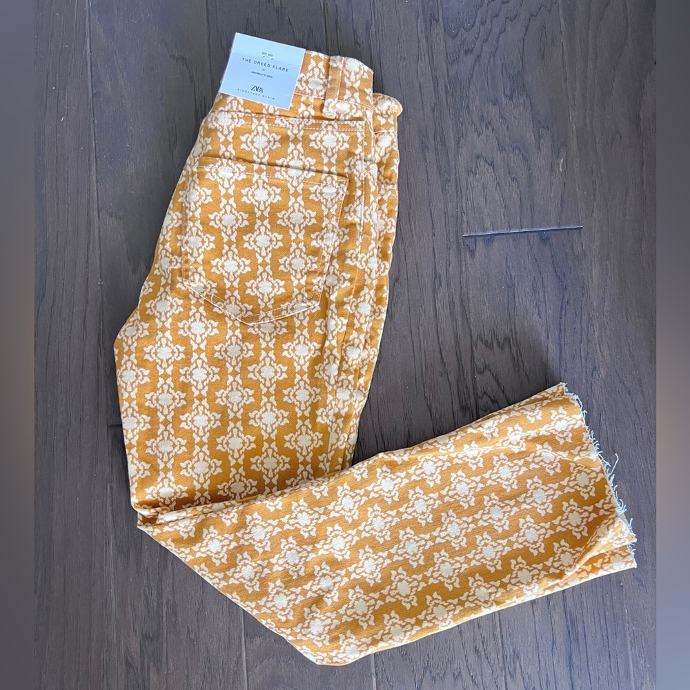 Zara printed Dreed Flare Orange/gold printed denim pant. Never worn.